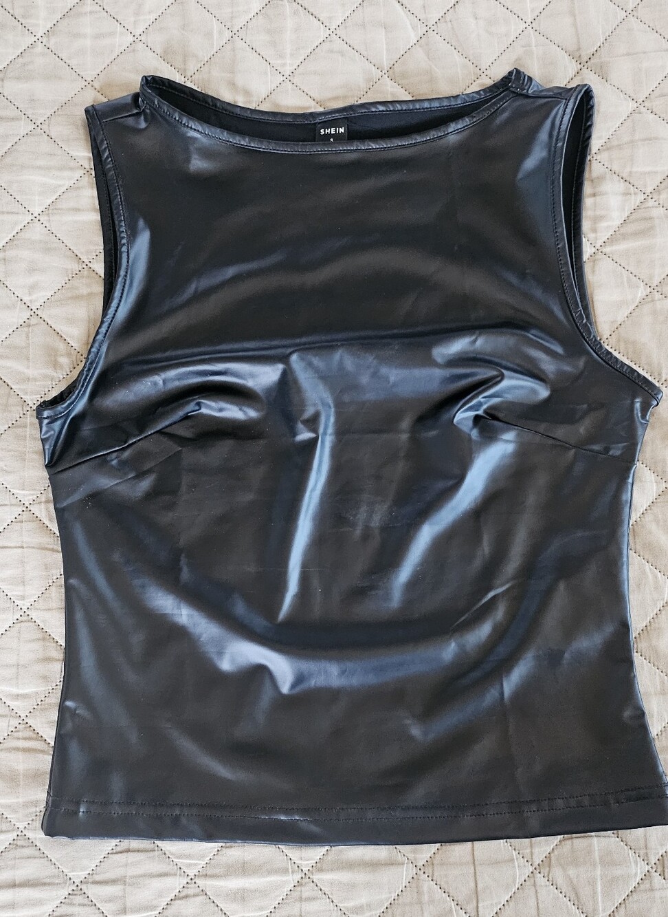 Women's size small black sleeveless top, brand is shein, in like new condition